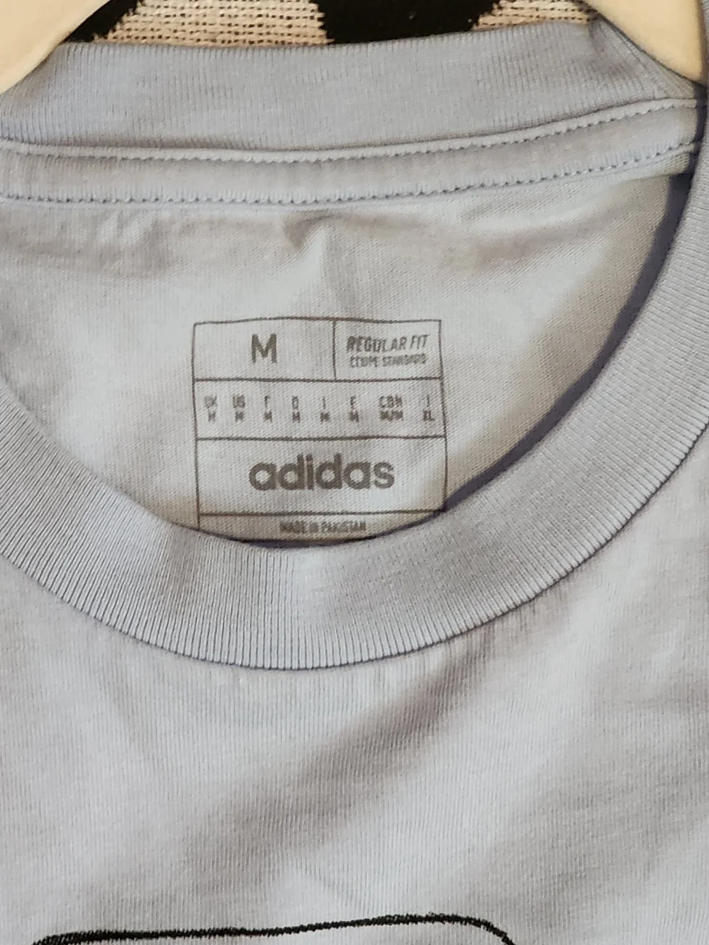 Adidas Light Blue Graphic Tee with Sloth Sports Design